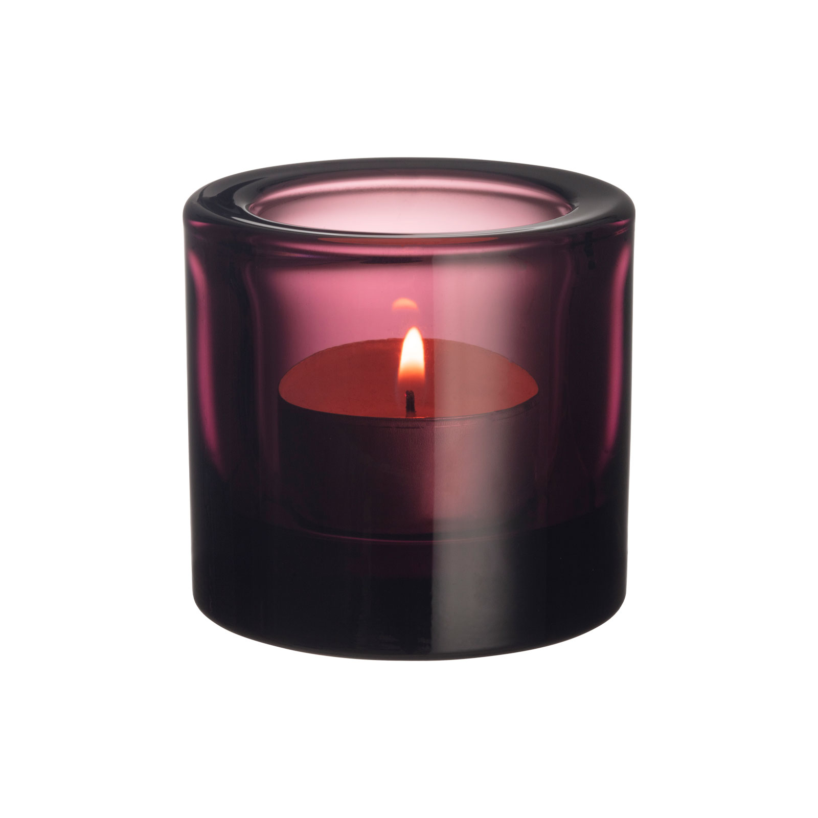 Das Kivi Teelicht in violett hat die typische zylindrische Form und besteht aus rauchig lilafarbenem Glas.