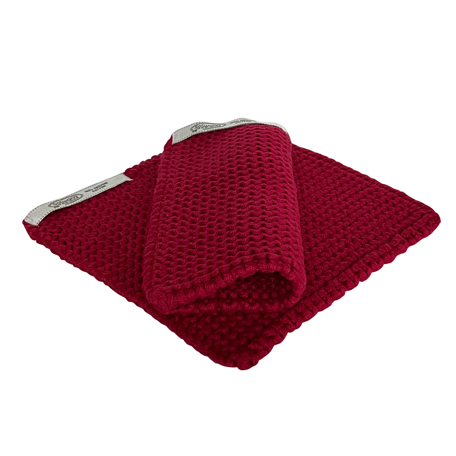 Einer der Solwand Topflappen in tiefrot liegt flach da und der zweite halb gefaltet obendrauf. Das Strickmuster ist toll zu erkennen.