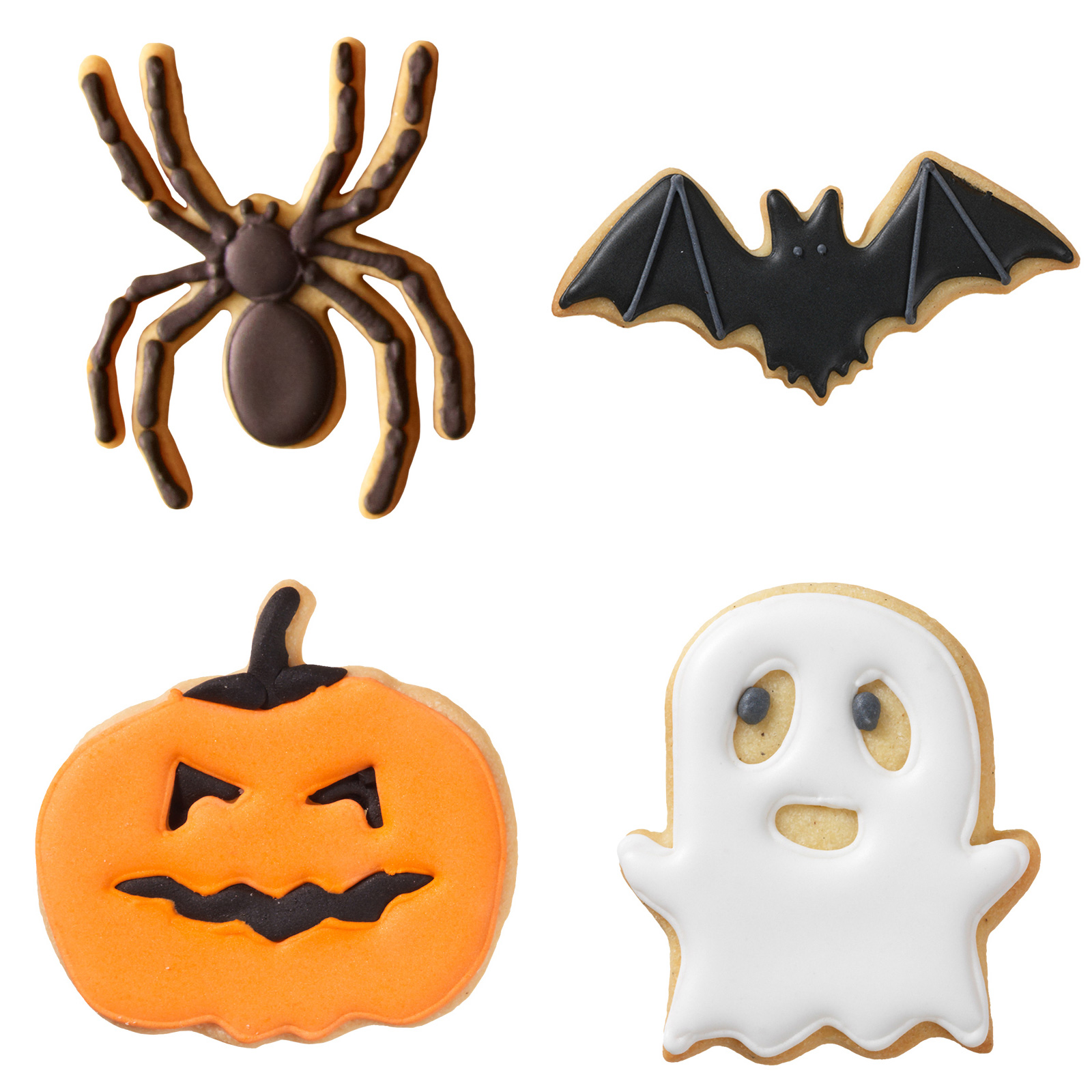 Gebackene und dekorierte Halloween Kekse in den Formen Kürbis, Geist, Spinne und Fledermaus.